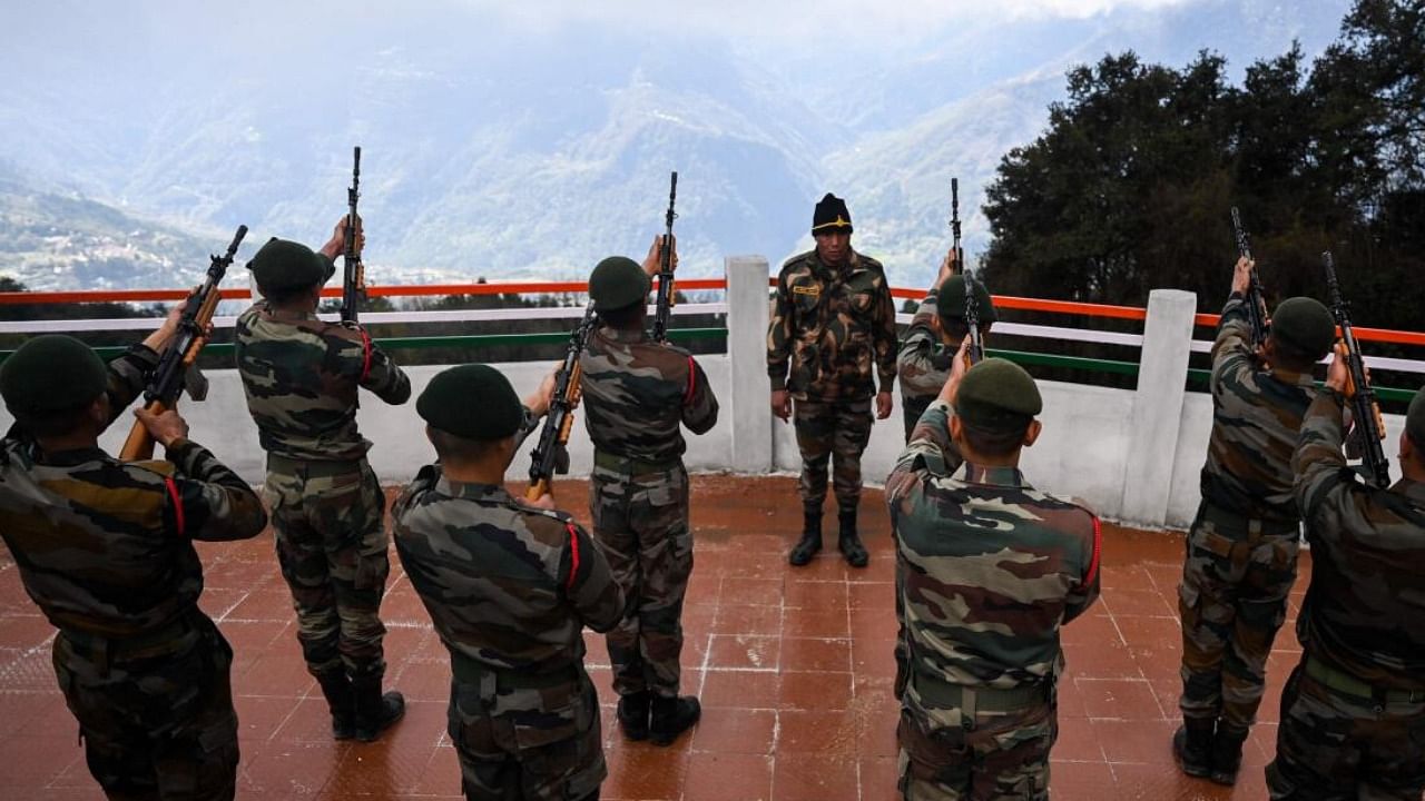 Indian army soldiers preparing for a drill at a war memorial in the Tawang district of Arunachal Pradesh. credit: Reuters Photo