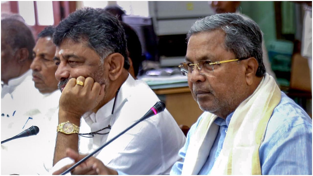 Karnataka Chief Minister Siddaramaiah and his deputy D K Shivakumar. Credit: PTI Photo