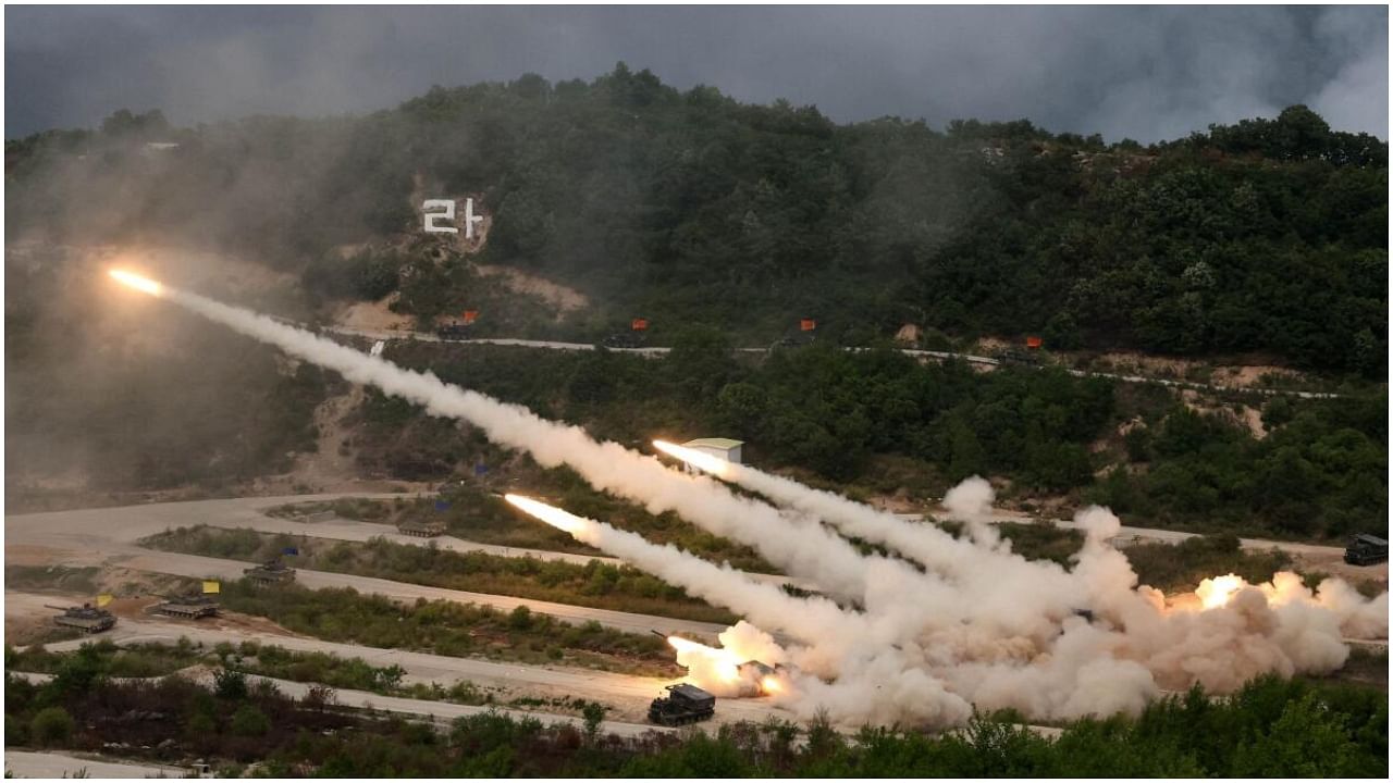 The South Korean army's multiple launch rocket systems fire rockets during South Korea-U.S. joint military drills at Seungjin Fire Training Field in Pocheon, South Korea May 25, 2023. Credit: Reuters Photo