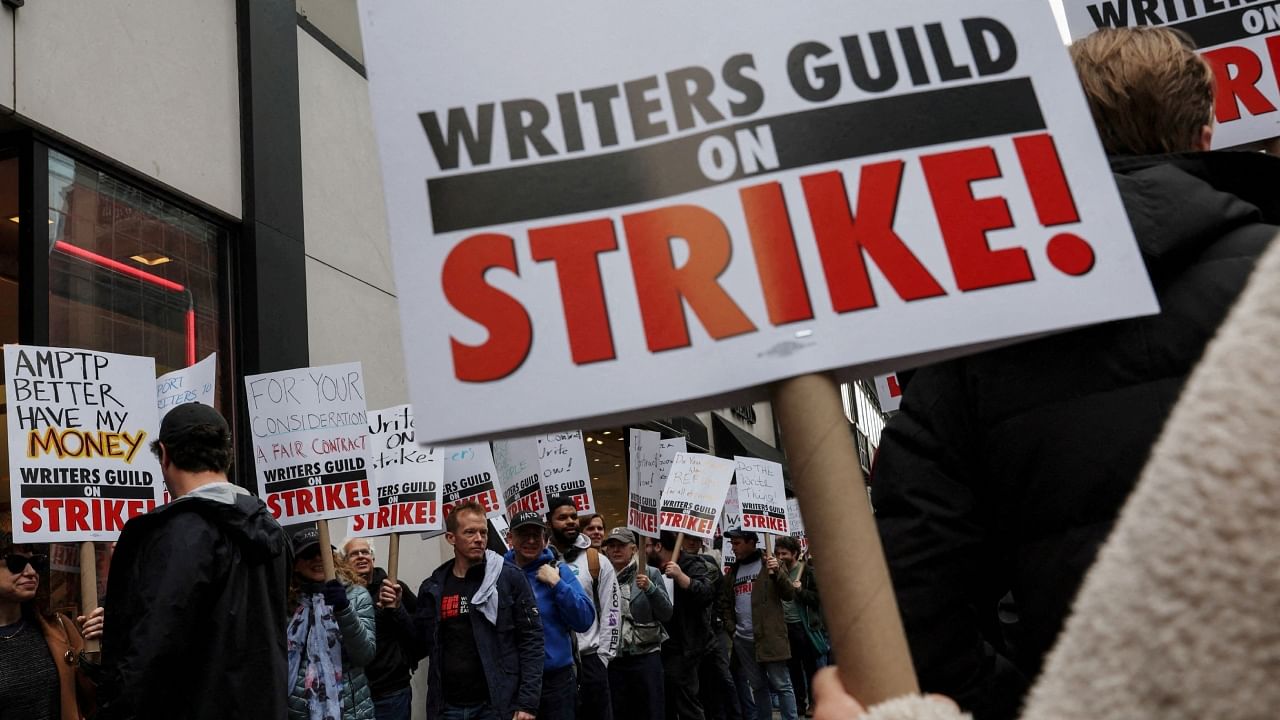 Members of the Writers Guild of America (WGA) East picket outside Peacock Newfront streaming service offices, in New York City, US, May 2, 2023. Credit: Reuters Photo