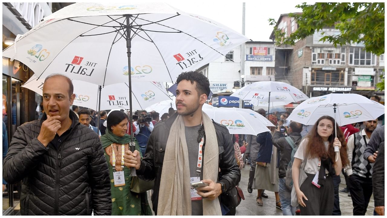 G2O delegates visit Polo View Market during their visit to Kashmir on the sidelines of 3rd G20 Tourism Working Group Meeting, in Srinagar, on Wednesday, May 24, 2023. Credit; IANS Photo