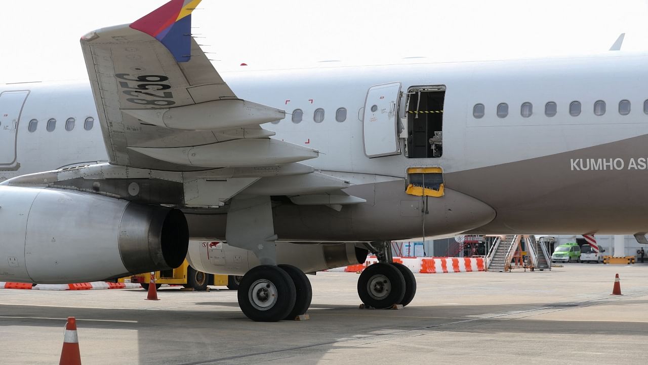 An opened door of an Asiana Airlines plane is seen at Daegu International Airport in Daegu on May 26. Credit: AFP/ Yonhap