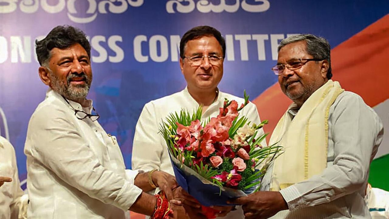 AICC in-charge of Karnataka Randeep Singh Surjewala with senior party leaders Siddaramaiah and D.K. Shivakumar during the Congress Legislature Party (CLP) meeting, in Bengaluru, Thursday, May 18, 2023. Credit: PTI Photo