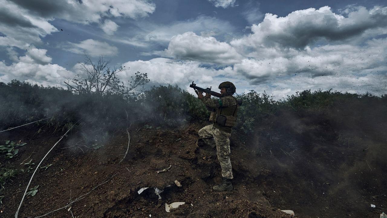 A Ukrainian soldier fires an RPG toward Russian positions at the frontline near Bakhmut in the Donetsk region, Ukraine. Credit: AP/PTI File Photo