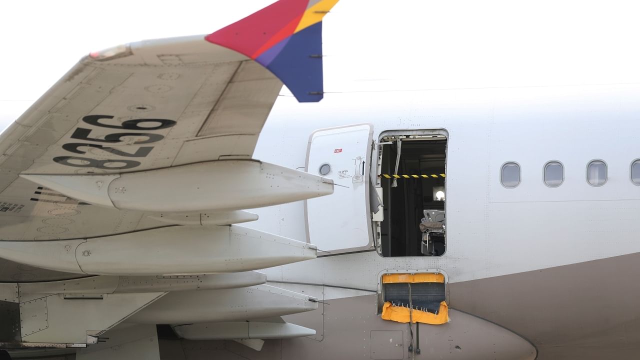 An Asiana Airlines plane is parked as one of the plane's doors suddenly opened at Daegu International Airport in Daegu, South Korea, Friday, May 26, 2023. Credit: AP/PTI Photo