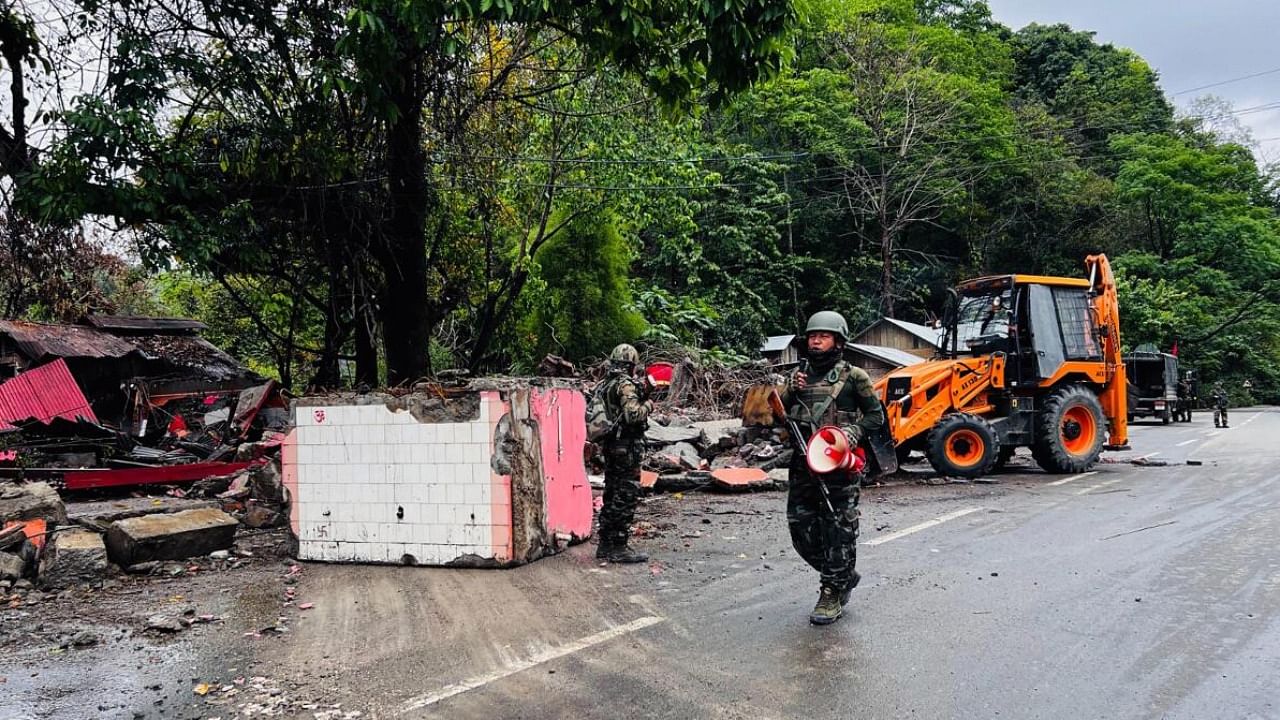 Army personnel guard in the aftermath of recent spurt in violence, in Manipur. Credit: PTI Photo
