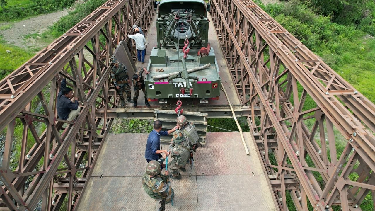 A bridge was damaged allegely by miscreants in Manipur. Photo credit: Indian Army