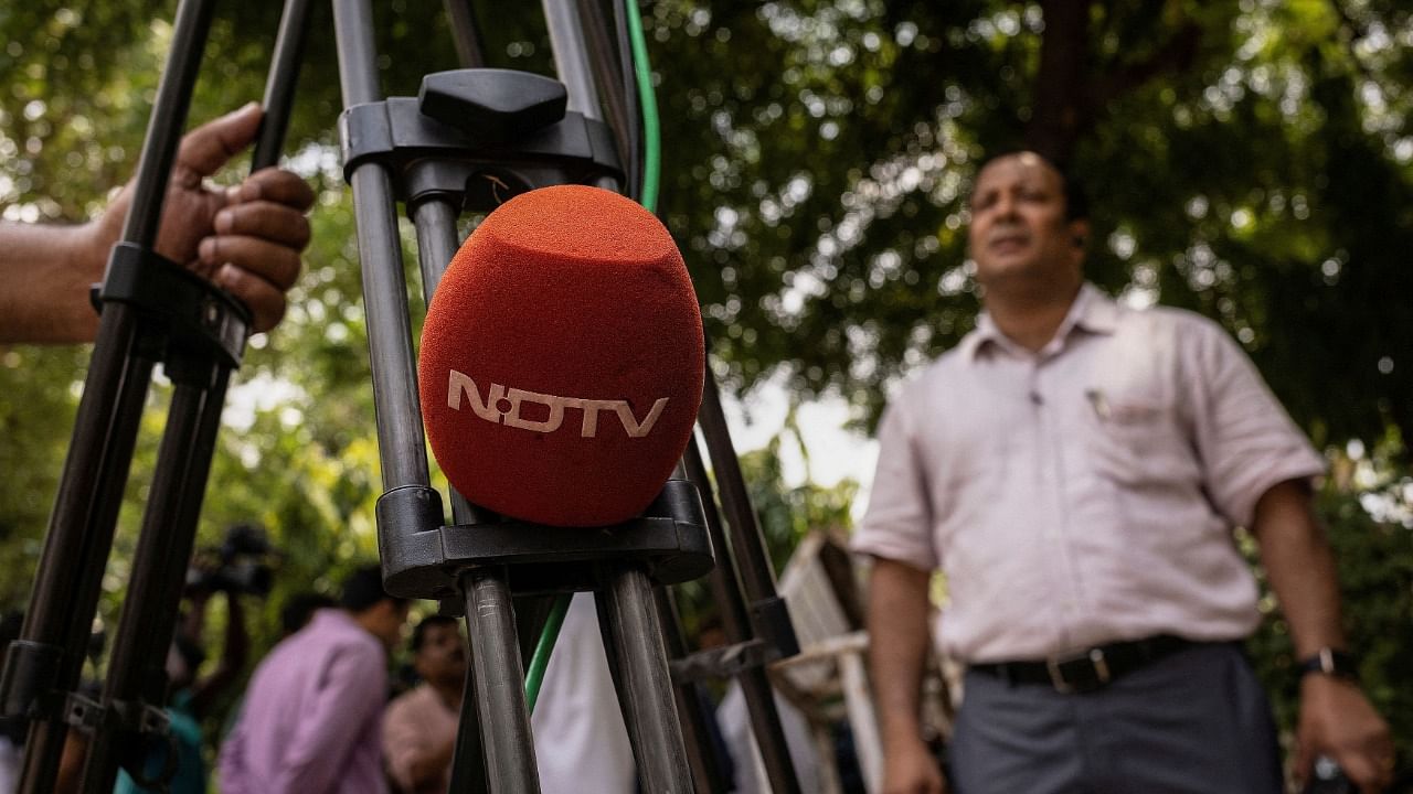 New Delhi Television (NDTV) microphone is seen on roadside in New Delhi. Credit: Reuters File Photo
