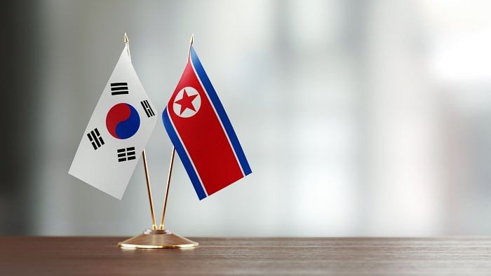 The flags of South Korea and North Korea (DPRK). Credit: iStock Photo