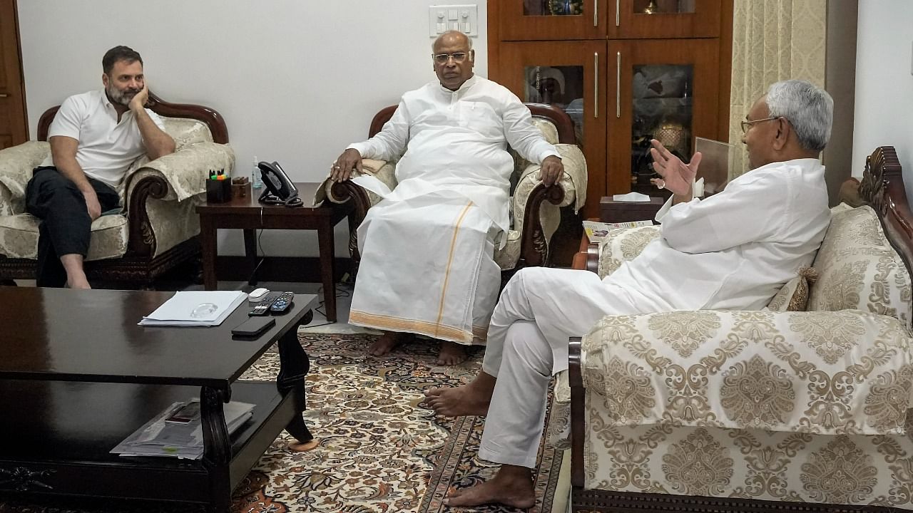 Bihar Chief Minister Nitish Kumar interacts with Congress President Mallikarjun Kharge and Congress leader Rahul Gandhi during a meeting, in New Delhi, Monday, May 22. Credit: PTI Photo