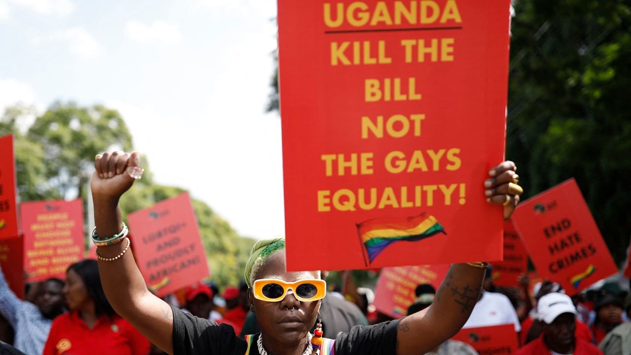 Uganda’s queer activist Papa De raises her fist outside the Uganda High Commission in Pretoria during a picket against the country’s anti-homosexuality bill. Credit: AFP File Photo