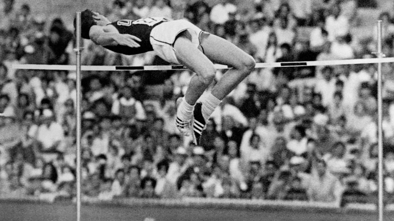 In this file photograph taken on October 20, 1968, US athlete Dick Fosbury competes in the men's high jump final and wins the gold medal with a brand new style of jumping at the Mexico Olympic Games in Mexico City. Credit: AFP Photo