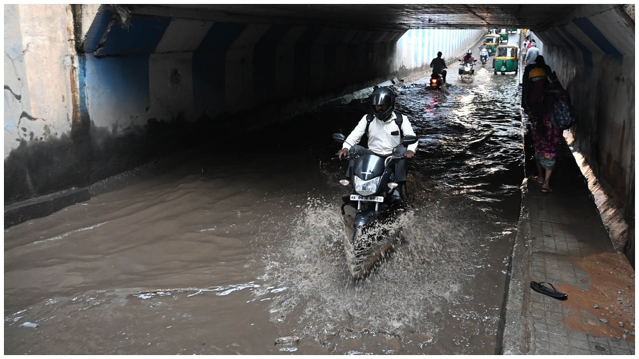Waterlogged underpass at Lingrajpura following heavy rain in Bengaluru. Credit: DH Photo by B K Janardhan