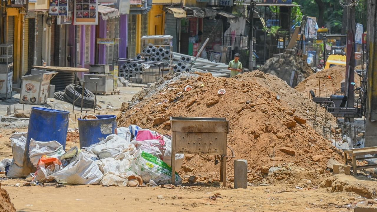 A Rs-6 crore facelift project at VV Puram food street, which is currently half done, has not moved since the announcement of the election result. Credit: DH Photo/S K Dinesh