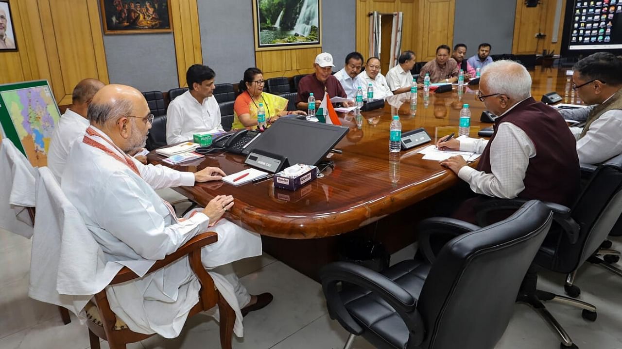 Union Home Minister Amit Shah chairs a meeting with a delegation of leaders from various political parties. Credit: PTI Photo