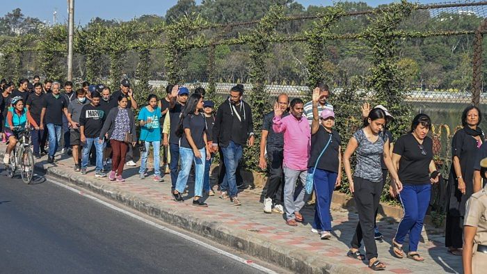 Residents are participated in a walk for ‘Walk to save Sankey’, against trees are removing and build a flyover. Credit: DH Photo