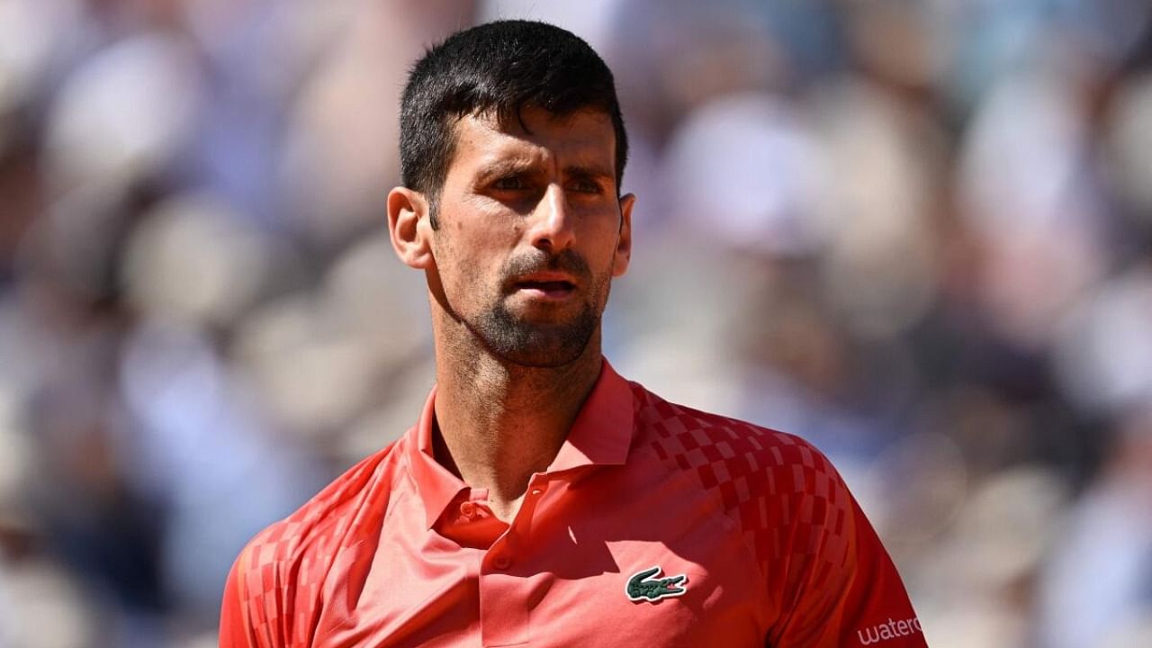 Serbia's Novak Djokovic looks on as he plays against US Aleksandar Kovacevic during their men's singles match on day two of the Roland-Garros Open tennis tournament at the Court Philippe-Chatrier in Paris on May 29, 2023. Credit: AFP Photo