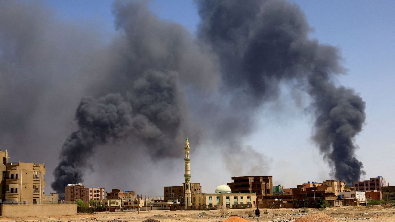 Smoke rises above buildings after aerial bombardment, during clashes between the paramilitary Rapid Support Forces and the army in Khartoum North. Credit: Reuters Photo