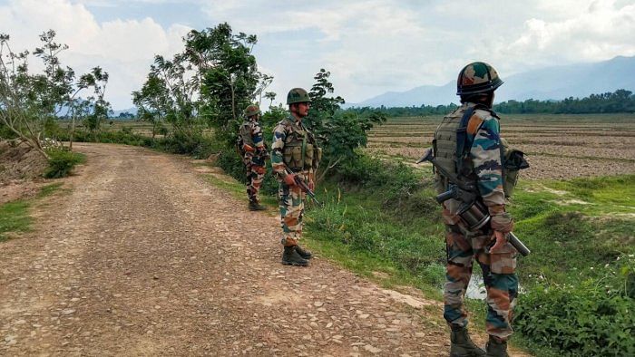 Army jawans stand guard in Manipur amid scattered issues of violence. Credit: PTI File Photo