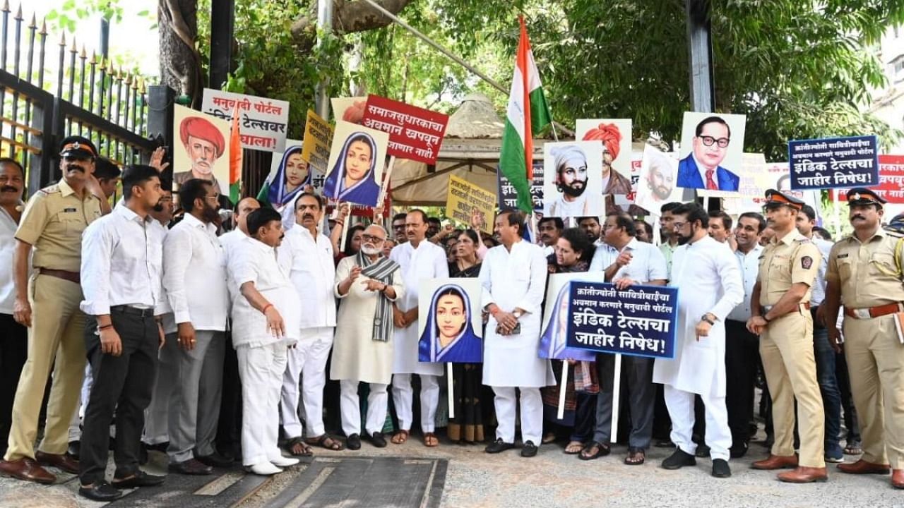 NCP leader Ajit Pawar, along with other leaders and supporters, during a protest against the derogatory article targeting social reformer Savitribai Phule, in Mumbai on Wednesday, May 31, 2023. Credit: IANS Photo