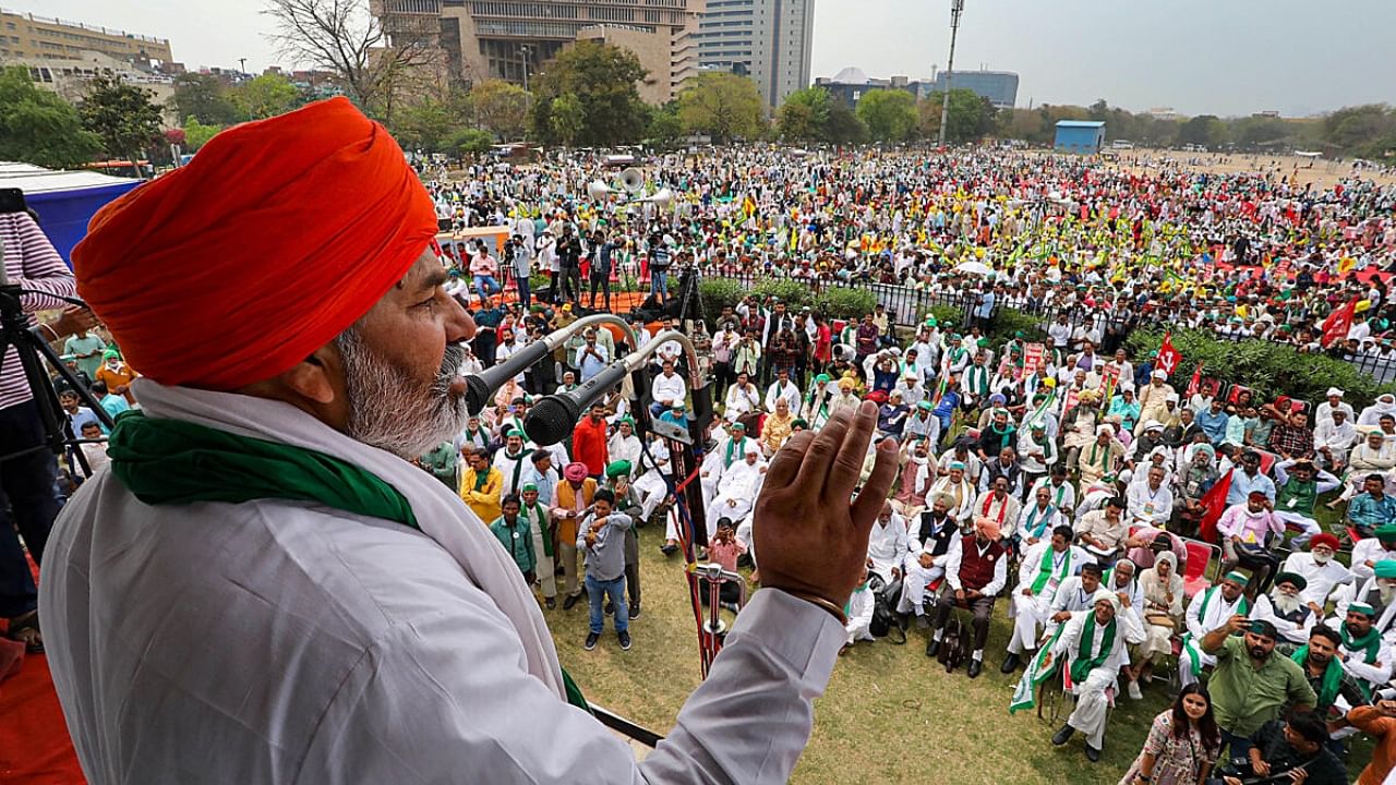 Bharatiya Kisan Union (BKU) leader Rakesh Tikait addresses during 'Kisan Mahapanchayat', organised by Samyukt Kisan Morcha (SKM), at Ramlila Maidan in New Delhi, Monday, March 20, 2023. Credit: PTI Photo