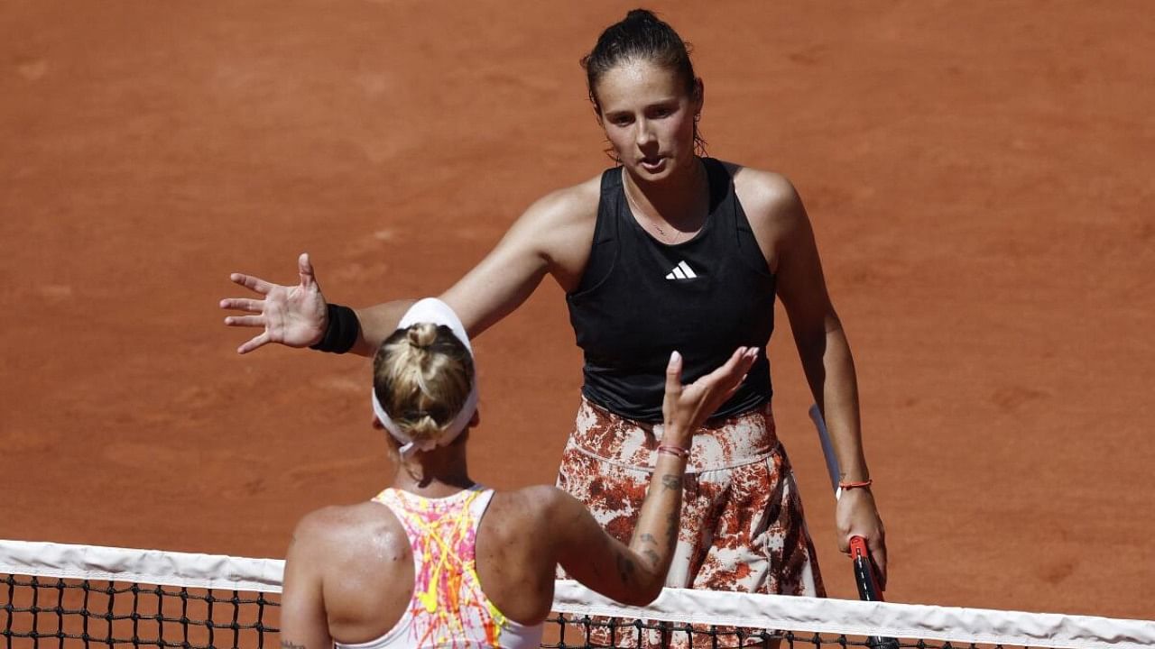 Tennis - French Open - Roland Garros, Paris, France - May 31, 2023 Russia's Daria Kasatkina and Czech Republic's Marketa Vondrousova shake hands after their second round match. Credit: Reuters Photo