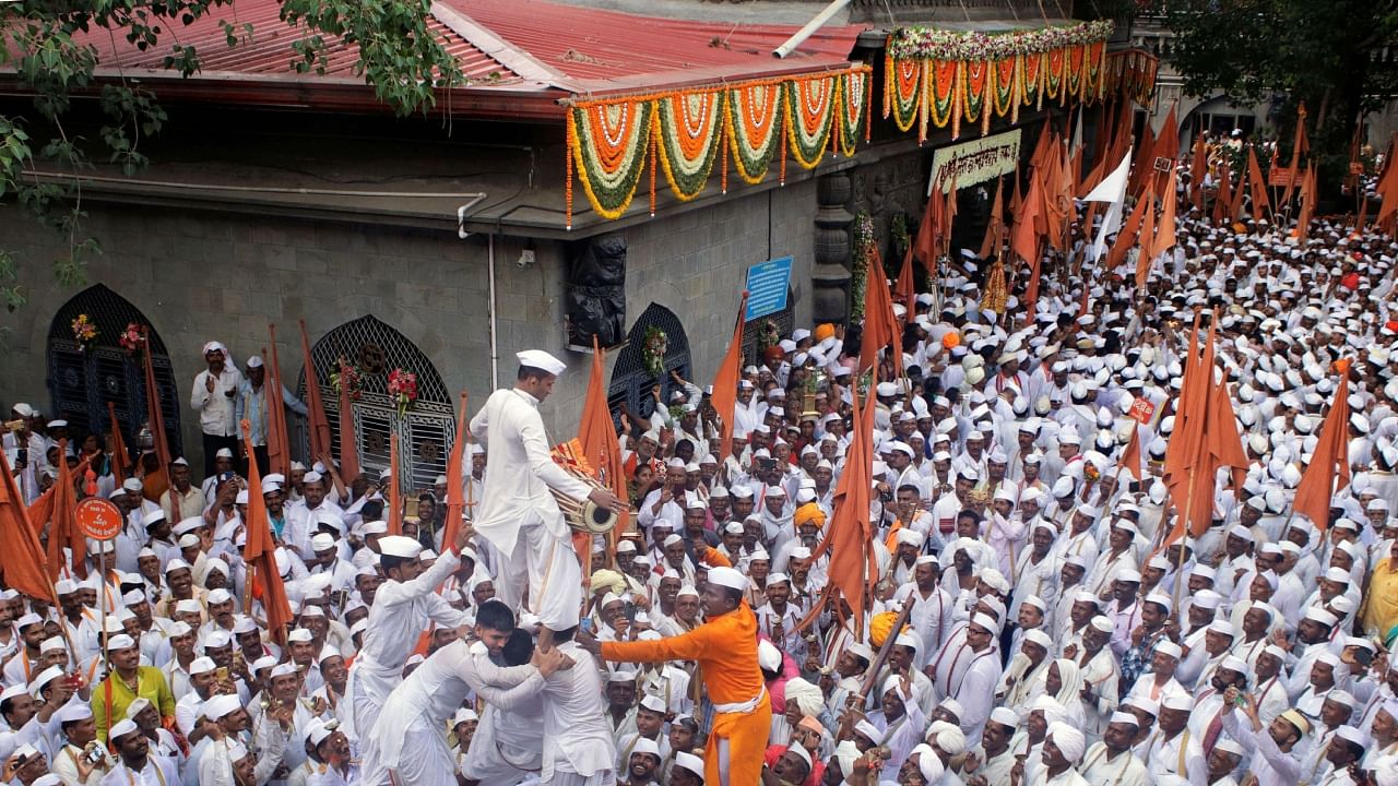 Scores of people from Maharashtra and other states arrive at the temple to participate in Pandharpur Wari or Annual Pilgrimage. Credit: PTI File Photo