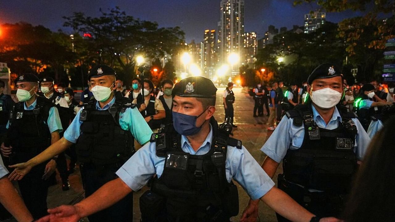 Police officers disperse people at the closed Victoria Park on the 33rd anniversary of the crackdown on pro-democracy demonstrations at Beijing's Tiananmen Square in 1989, in Hong Kong, China, June 4, 2022. Credit: Reuters File Photo