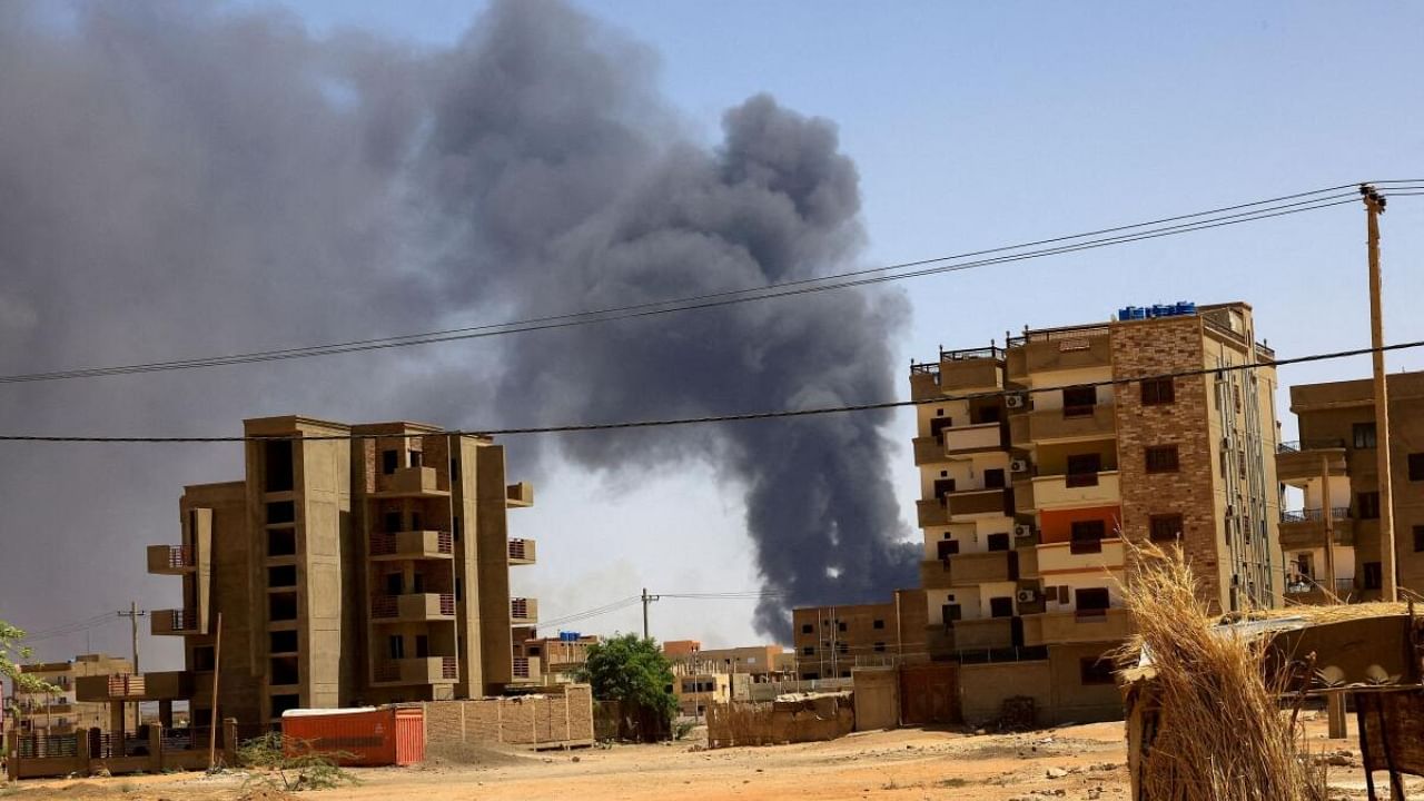 Smoke rises above buildings after an aerial bombardment, during clashes between the paramilitary Rapid Support Forces and the army in Khartoum North, Sudan, May 1, 2023. Credit: Reuters File Photo