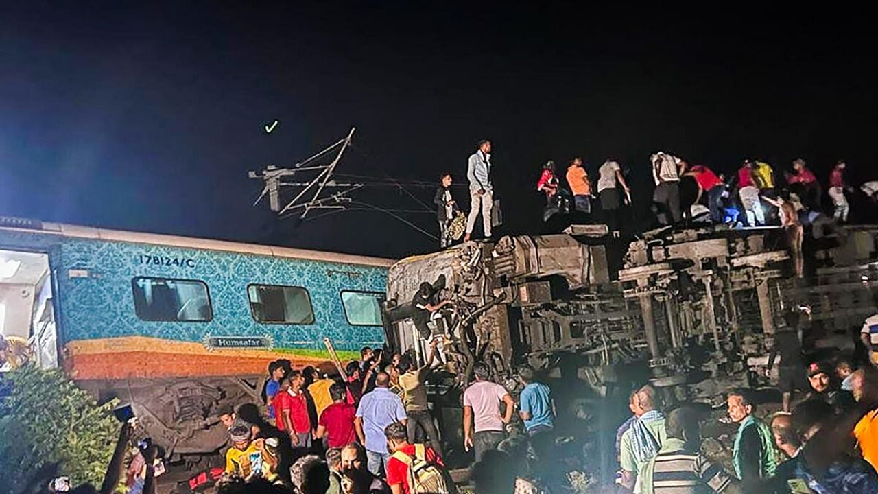 Rescue operation being conducted after four coaches of the Coromandel Express derailed after a head-on collision with a goods train. Credit; PTI Photo