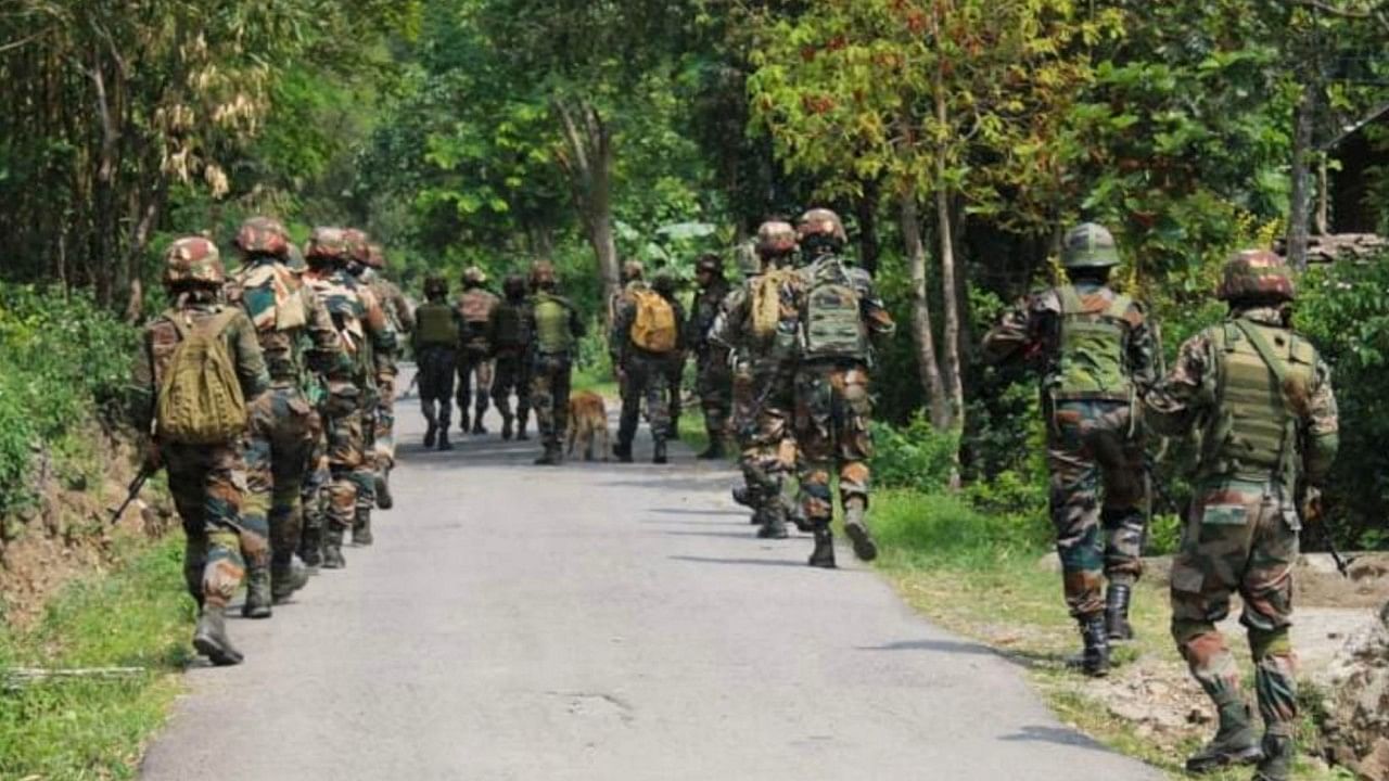 Army, Assam Rifles, CAPF & Police personnel during their 'Extensive Area Domination Operations' to bring peace & harmony in violence-hit areas of Manipur. Credit: PTI Photo
