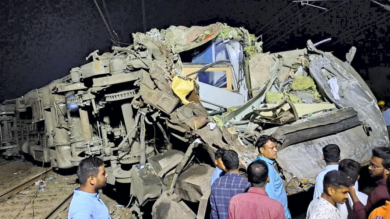 Rescue operation underway at the site where Coromandel Express, Bengaluru-Howrah Express and a goods train derailed, in Balasore district, Friday night, June 2, 2023. Credit: PTI Photo
