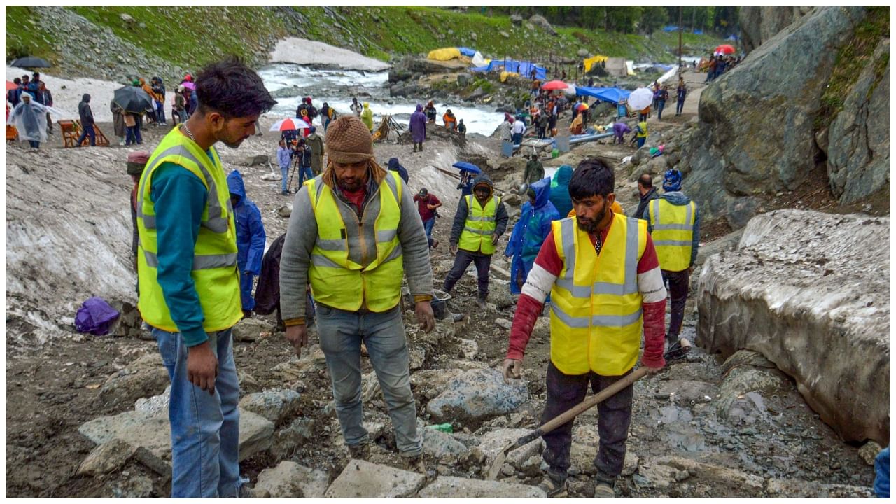 BRO personnel during the restoration work on the Amarnath Yatra track, in Pahalgam. Credit: PTI Photo