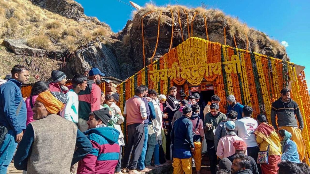 Devotees offer prayers during the opening of the doors of the Kedar Rudranath temple in Chamoli district of Uttarakhand. Credit: PTI File Photo