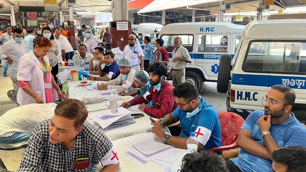 Health workers at a help desk at Howrah railway station following the accident in Odisha's Balasore. credit: PTI Photo