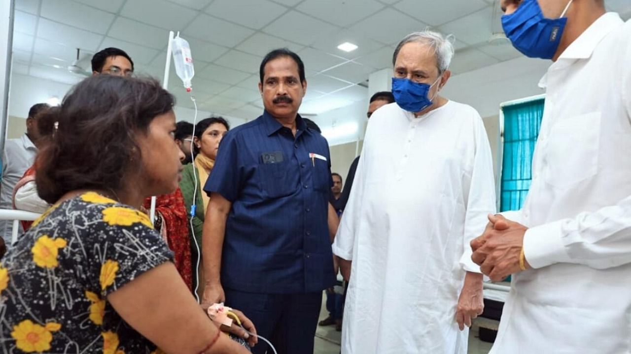 Odisha CM Naveen Patnaik meets injured passengers at a hospital after the Balasore train accident. Credit: IANS Photo