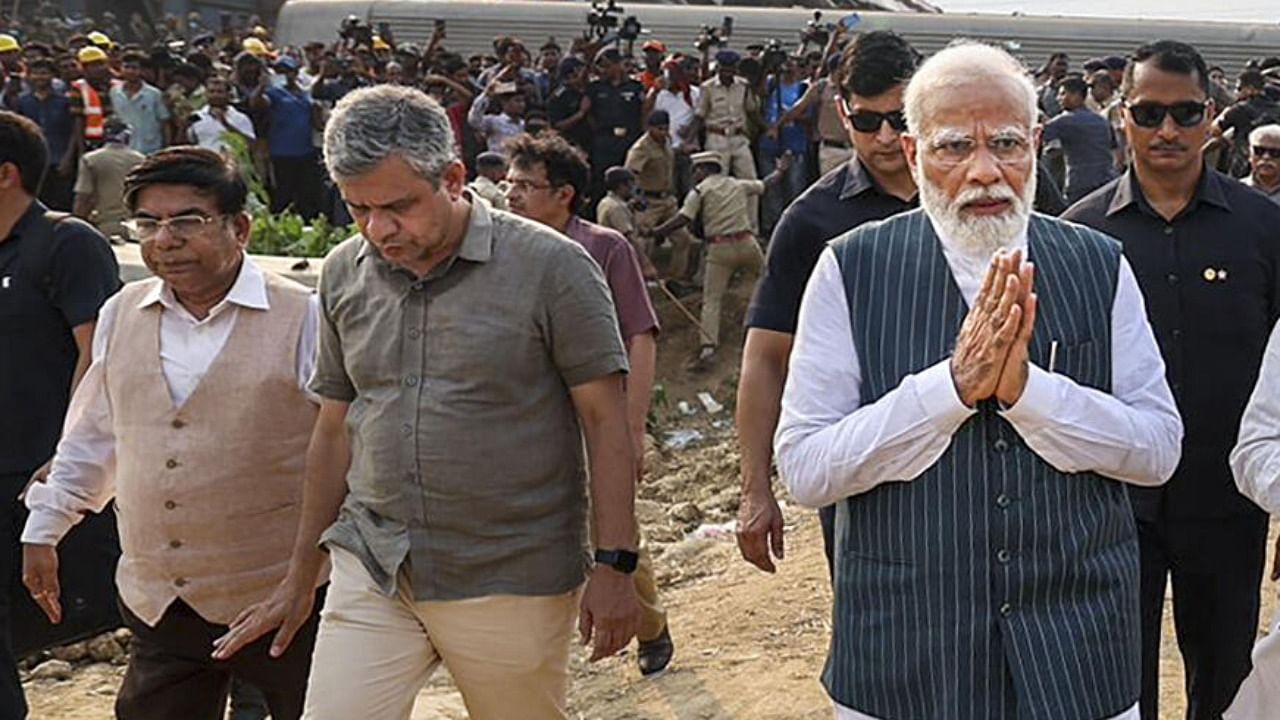 PM Modi with Union Railway Minister Ashwini Vaishnaw at the Odisha train accident site. Credit: PTI Photo
