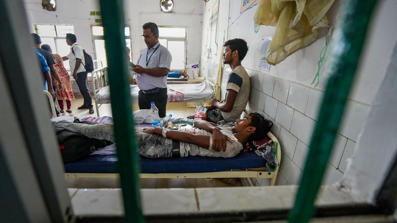 An injured passenger receives treatment at Soro Hospital in Odisha. Credit: PTI Photo