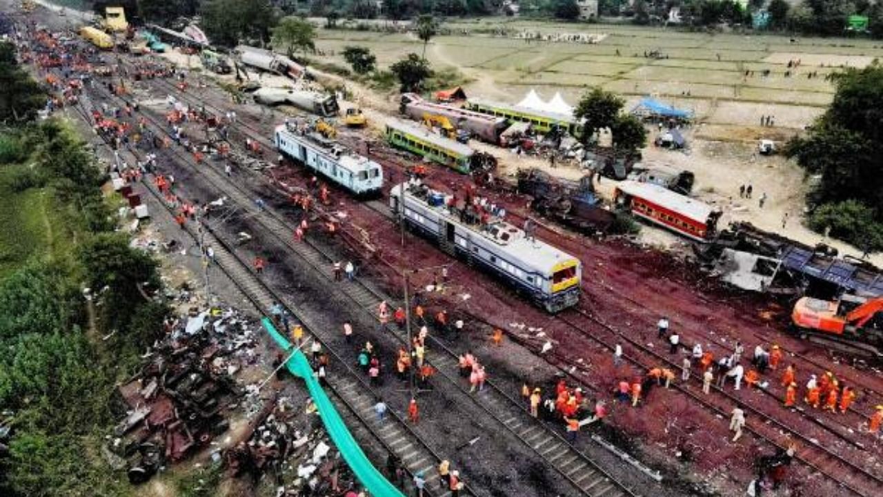  Drone shot of the restoration work at the site of Friday's triple train accident. Credit: PTI Photo