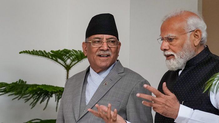 Prime Minister Narendra Modi with Prime Minister of Nepal Pushpa Kamal Dahal 'Prachanda'. Credit: PTI Photo 