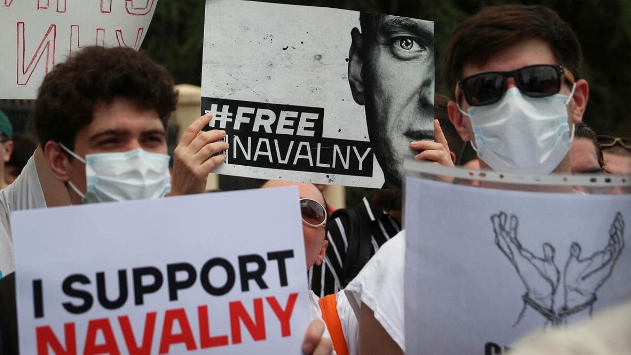 Activists hold a rally in support of jailed Russian opposition politician Alexei Navalny in front of the building of Russian Federation Interests Section of the Embassy of Switzerland, in Tbilisi, Georgia June 4, 2023.  Credit: Reuters Photo