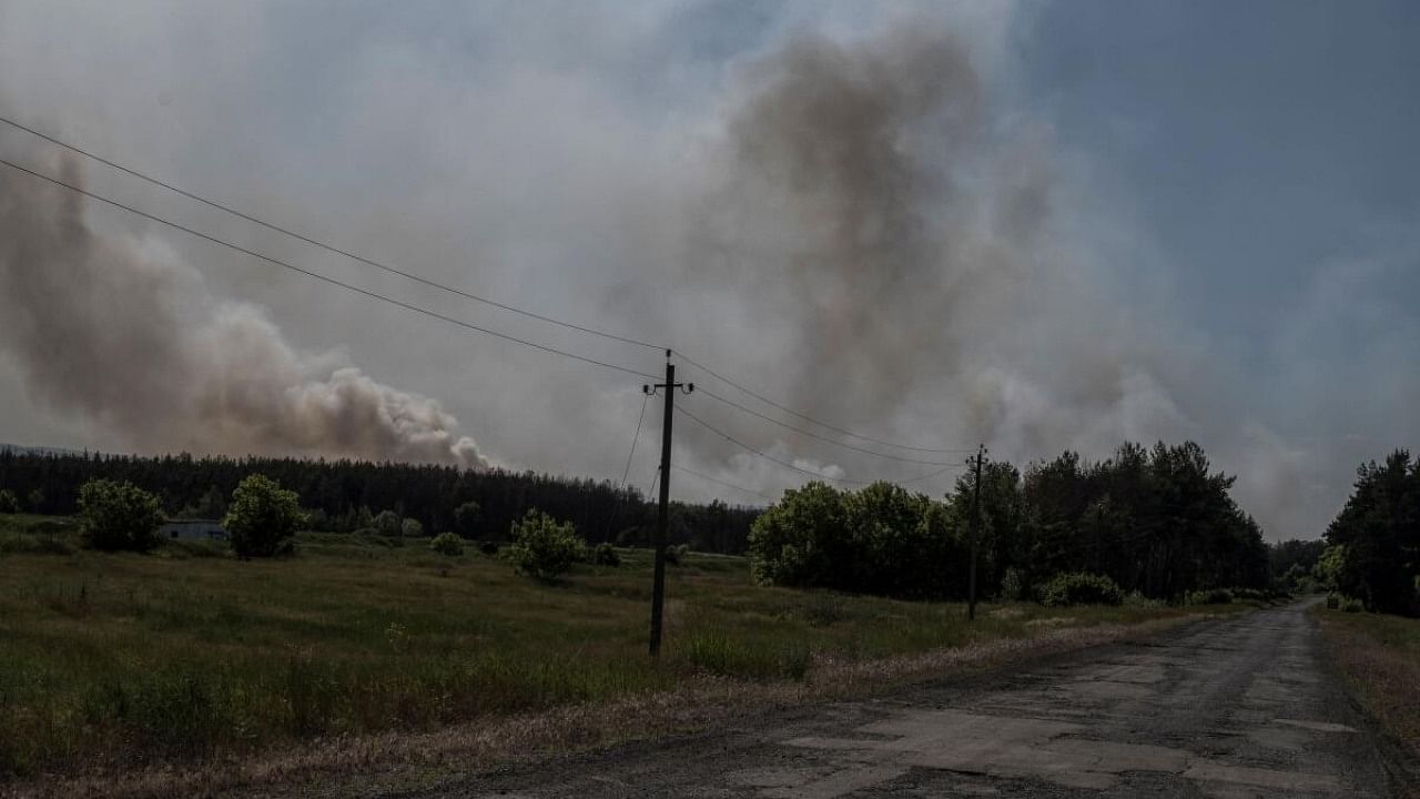 Smoke rises over an area of the Ukraine-Russia border, amid Russia's attack on Ukraine, in Kharkiv region, Ukraine, June 4, 2023. Credit: Reuters Photo