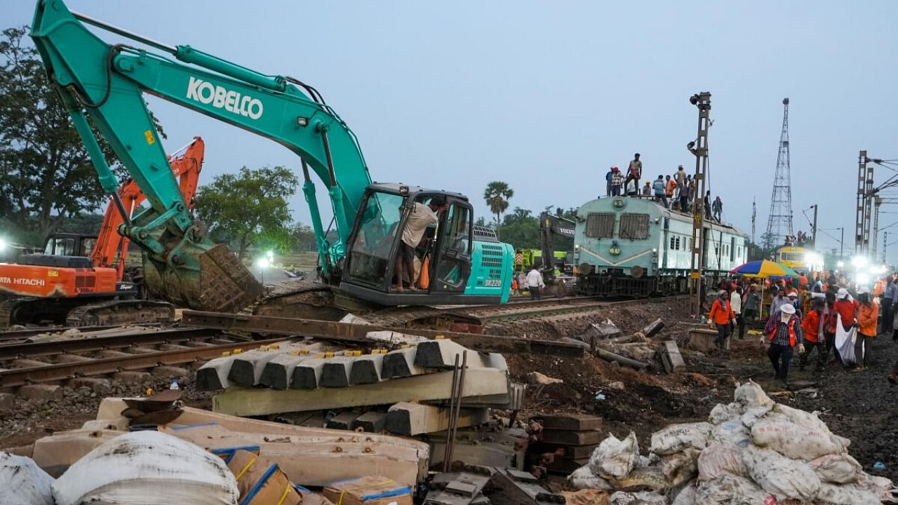 Restoration work at the site of Friday's triple train accident near Bahanaga Bazar railway station, in Balasore district, Sunday, June 4, 2023. At least 288 people were killed and over 1000 others suffered injuries in the accident, according to officials.  Credit: PTI Photo