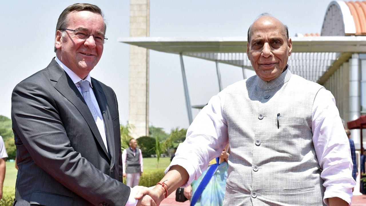 Defence Minister Rajnath Singh receives German Federal Minister of Defence Boris Pistorius as the latter arrives for a Guard of Honour at Manekshaw Centre. Credit: IANS Photo