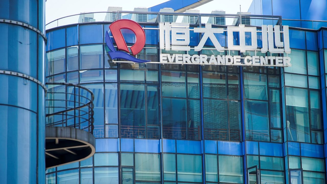 The logo of China Evergrande Group seen on the Evergrande Center in Shanghai, China September 22, 2021. Credit: Reuters Photo