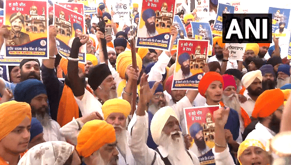 Radical Sikh outfit Dal Khalsa's activists were seen holding placards bearing portraits of slain militant leader Jarnail Singh Bhidnrawale. Credit: Twitter/@ANI