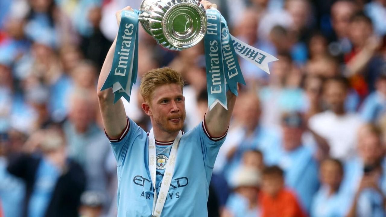 Kevin De Bruyne with the FA Cup trophy. Credit: Reuters Photo