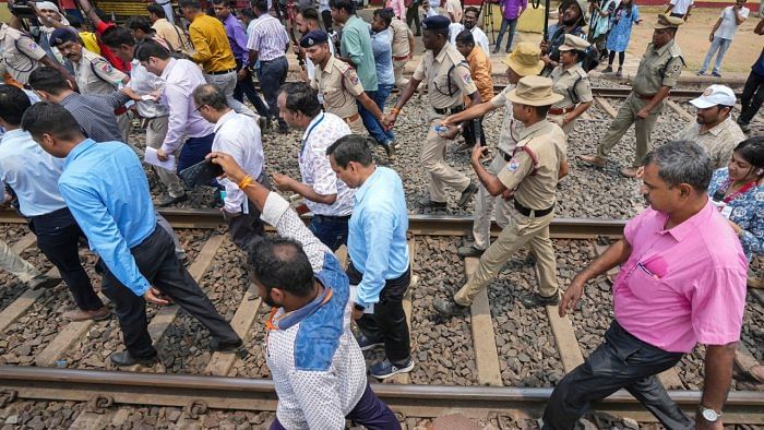 CBI officials during the investigation into the triple-train accident, near Bahanga Bazar railway station in Balasore district. Credit: PTI Photo