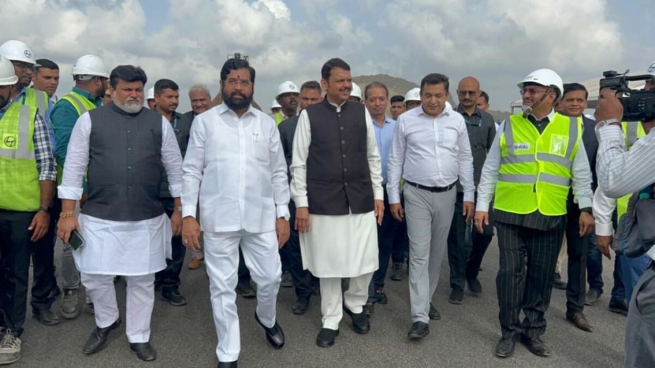 Eknath Shinde, Devendra fadnavis examine the ongoing work at the upcoming Navi Mumbai airport. Credit: Special Arrangement