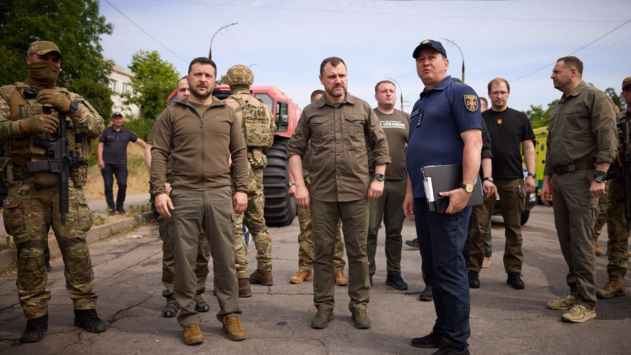 In separate posts, also accompanied by video footage, the president said he had visited a Kherson road crossing where people were being evacuated. Twitter/@ZelenskyyUa